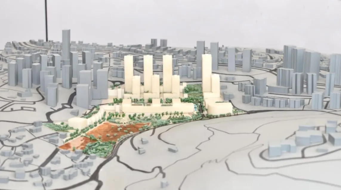 הדמיה של תוכנית כרמית בקריית יובל עם שמונה מגדלים ופארק ציבורי